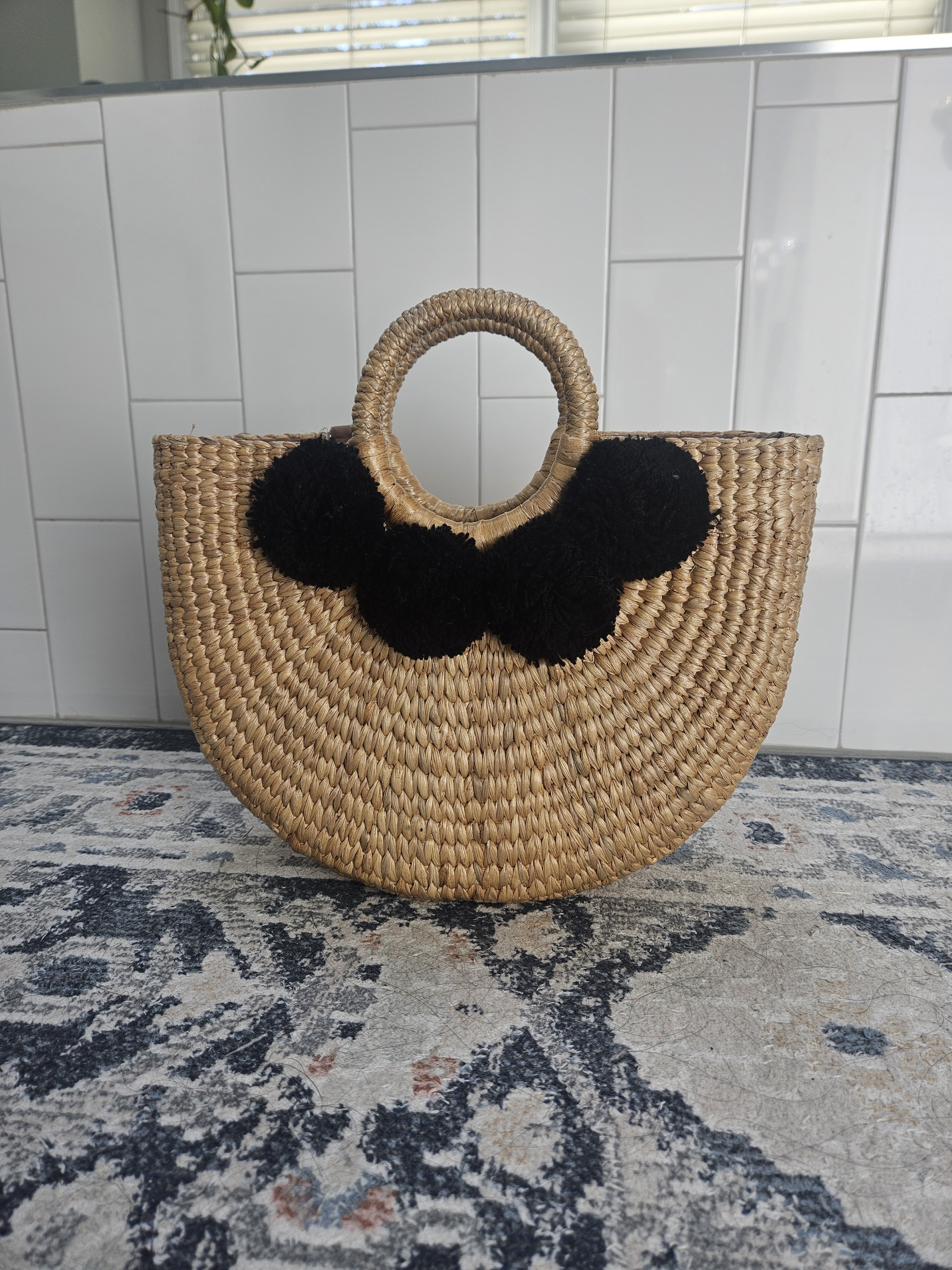 Camryn Pom-Pom Seagrass Top Handle Bag